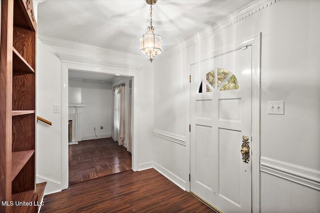 5123 Forest Hill Rd, Byram, MS 39272 - entrance foyer with a chandelier, crown molding, a fireplace, baseboards, and parquet floors