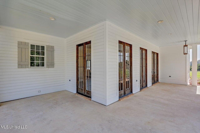 view of patio featuring french doors