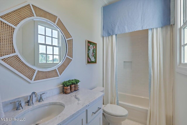 full bathroom featuring toilet, shower / tub combo with curtain, and vanity