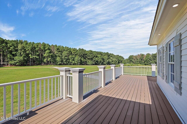 deck featuring a yard