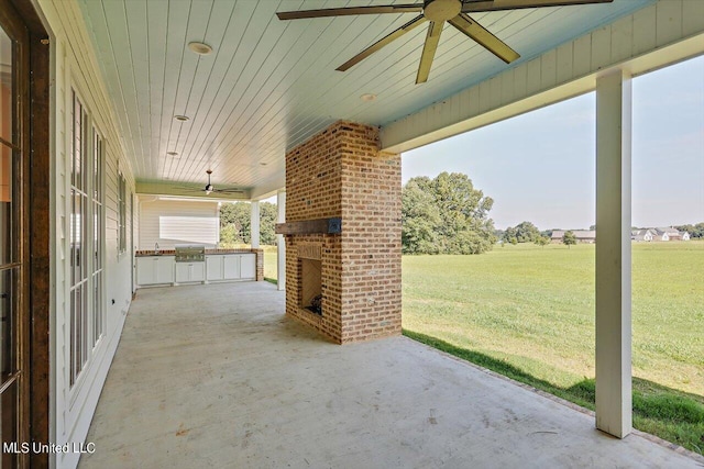 view of patio / terrace with grilling area and ceiling fan