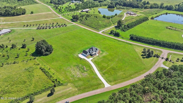 bird's eye view with a water view and a rural view