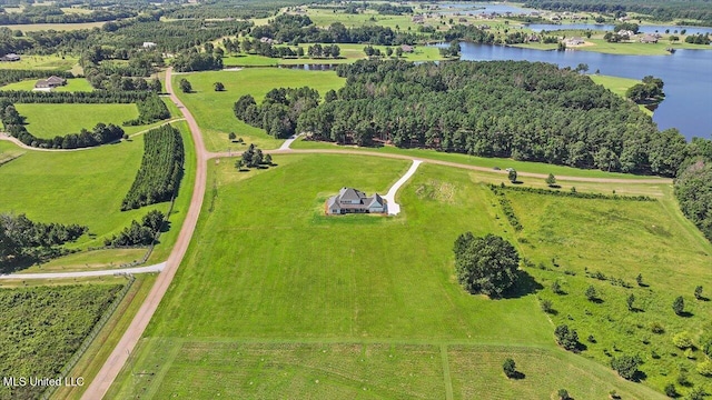 drone / aerial view with a water view and a rural view