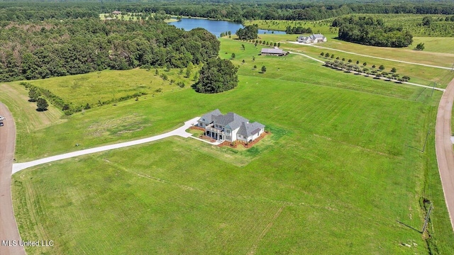 birds eye view of property with a water view and a rural view