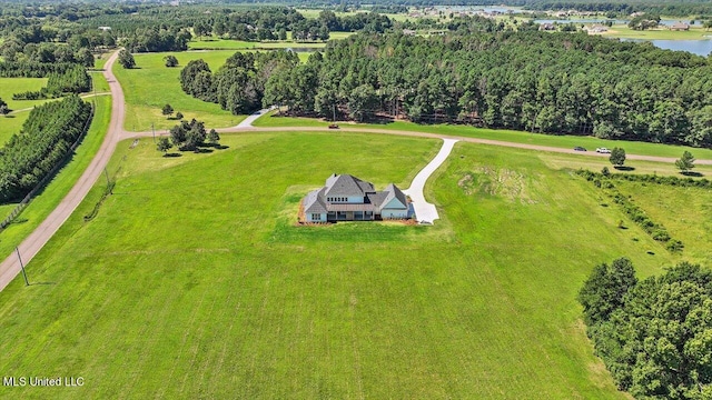 aerial view with a rural view and a water view