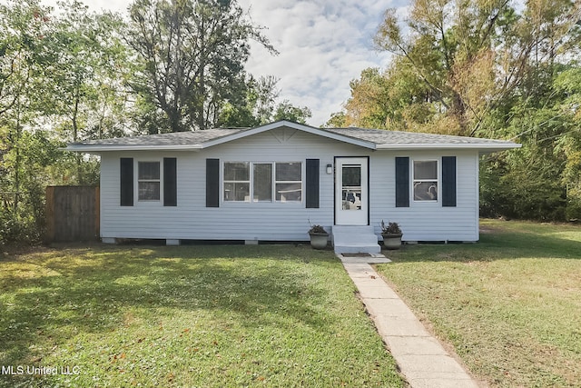 view of front of home with a front lawn