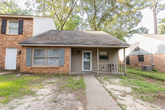 view of front of house featuring central AC and a porch