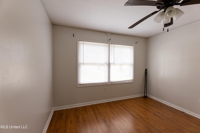 unfurnished room featuring ceiling fan and hardwood / wood-style floors