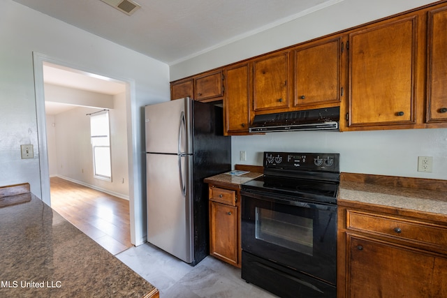 kitchen featuring black / electric stove, light hardwood / wood-style floors, ventilation hood, and stainless steel fridge