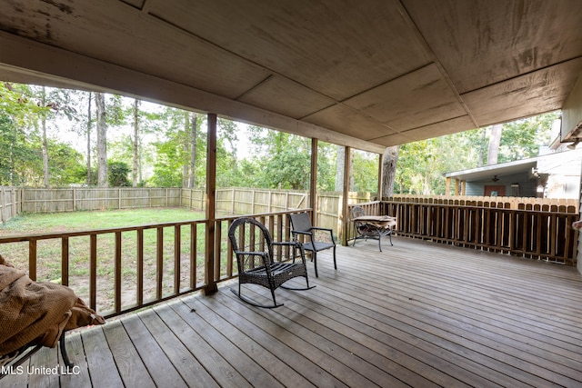 deck featuring a yard