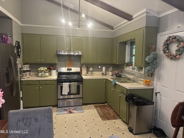 434 Boehle St, Pearl, MS 39208 - kitchen with green cabinetry, appliances with stainless steel finishes, under cabinet range hood, light countertops, and light flooring