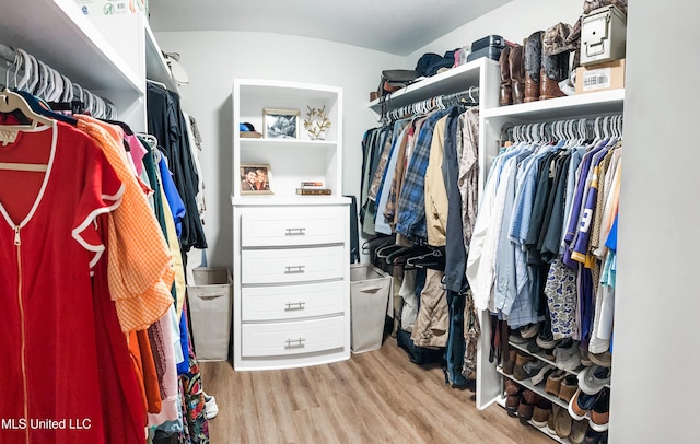 walk in closet featuring light wood-type flooring