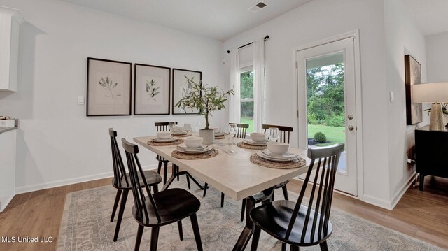 96 Twin Lakes Dr, Byhalia, MS 38611 - dining room featuring light wood-style flooring