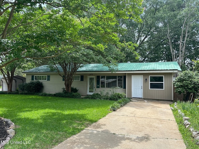365 Gatewood Dr, Pearl, MS 39208 - single story home featuring a front lawn, concrete driveway, and metal roof