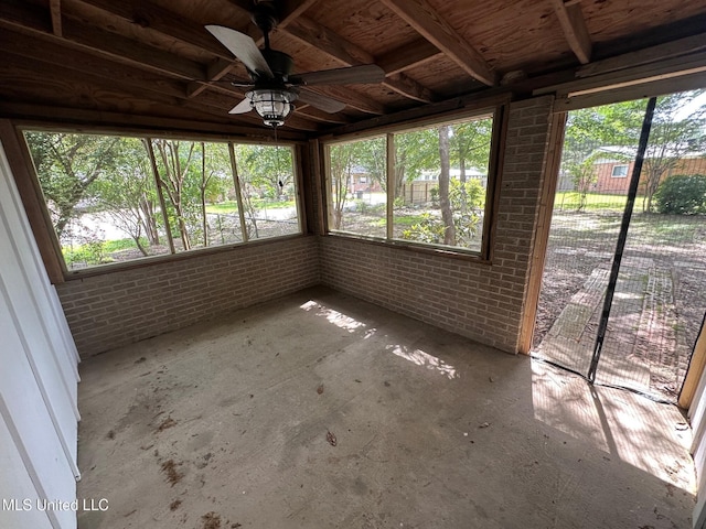 365 Gatewood Dr, Pearl, MS 39208 - unfurnished sunroom with brick wall, a ceiling fan, and plenty of natural light