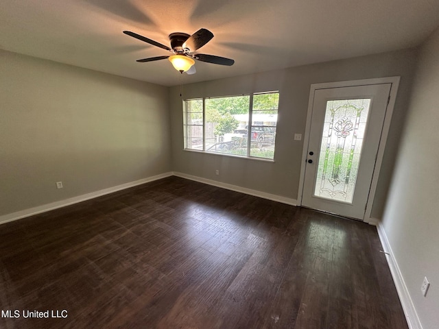 365 Gatewood Dr, Pearl, MS 39208 - empty room with dark wood finished floors, a ceiling fan, and baseboards