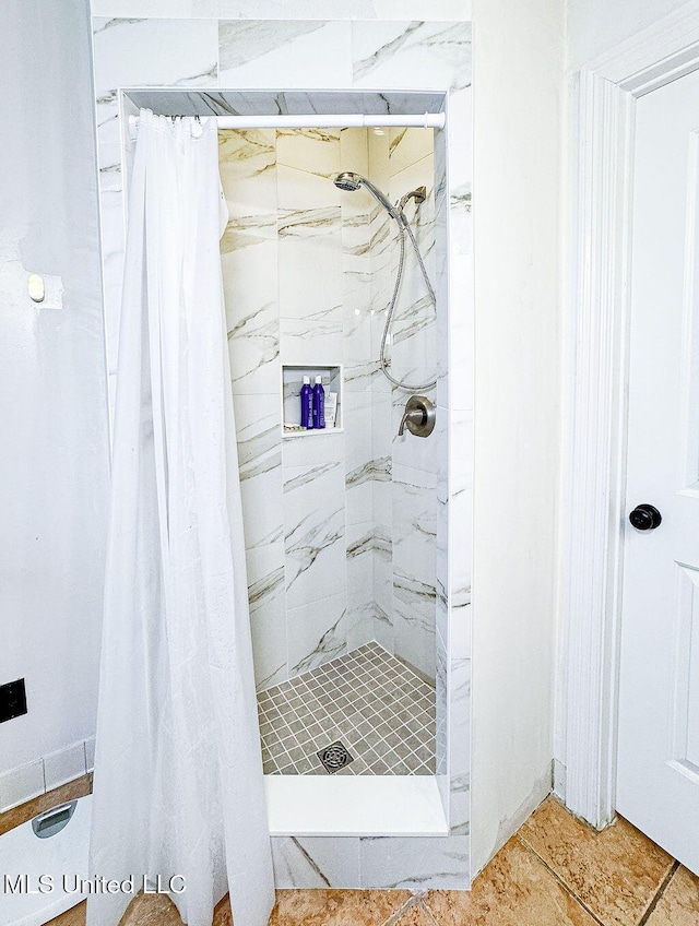 full bath featuring a stall shower