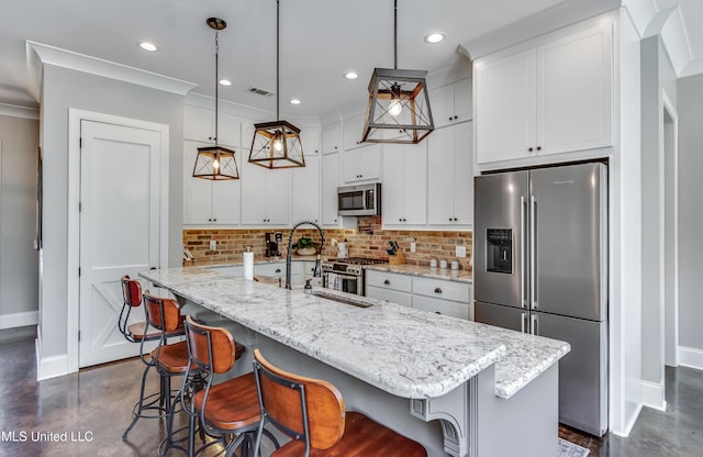 150 Pine Ridge Cir, Brandon, MS 39047 - kitchen with finished concrete flooring, tasteful backsplash, appliances with stainless steel finishes, and baseboards