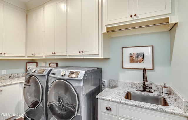 150 Pine Ridge Cir, Brandon, MS 39047 - washroom with washer and dryer, a sink, and cabinet space