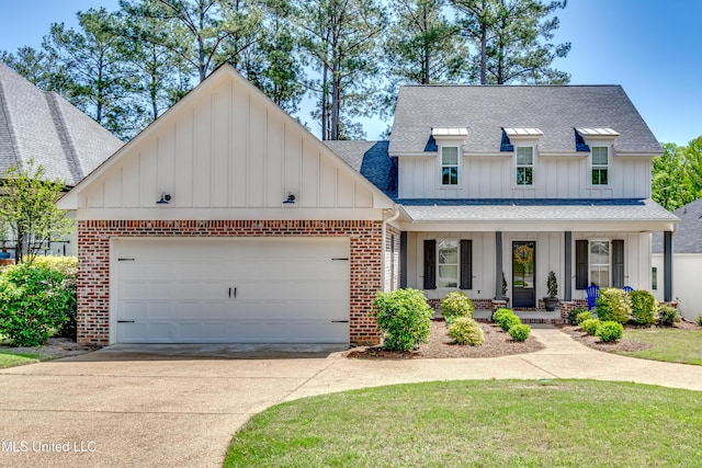 150 Pine Ridge Cir, Brandon, MS 39047 - view of front of property featuring roof with shingles, driveway, covered porch, brick siding, and board and batten siding