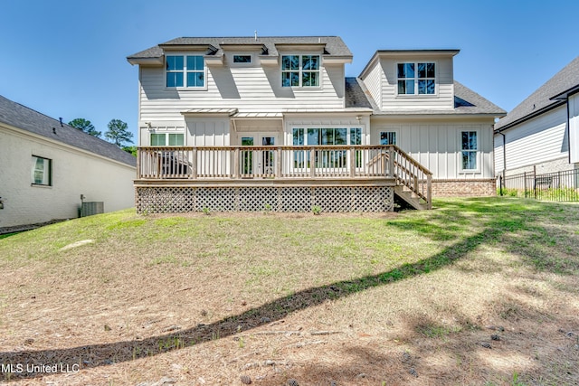 150 Pine Ridge Cir, Brandon, MS 39047 - back of property with fence, a yard, board and batten siding, a wooden deck, and roof with shingles