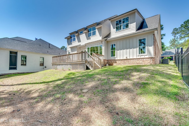 150 Pine Ridge Cir, Brandon, MS 39047 - rear view of house featuring fence, a yard, central air condition unit, board and batten siding, and a deck