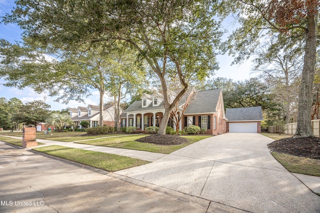 view of front of home featuring a front yard and a garage