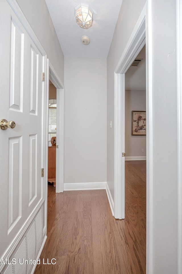3607 Dijon Ave, Ocean Springs, MS 39564 - corridor featuring light wood-style flooring and baseboards