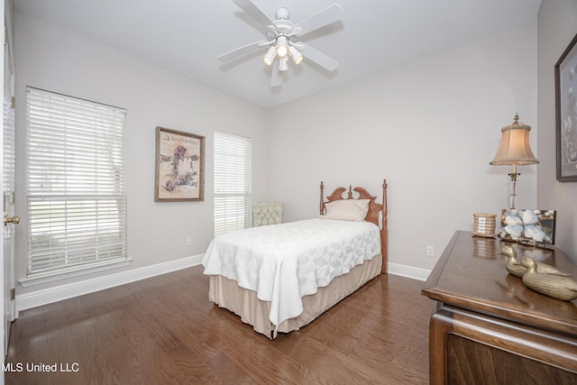 bedroom featuring dark wood-type flooring and ceiling fan