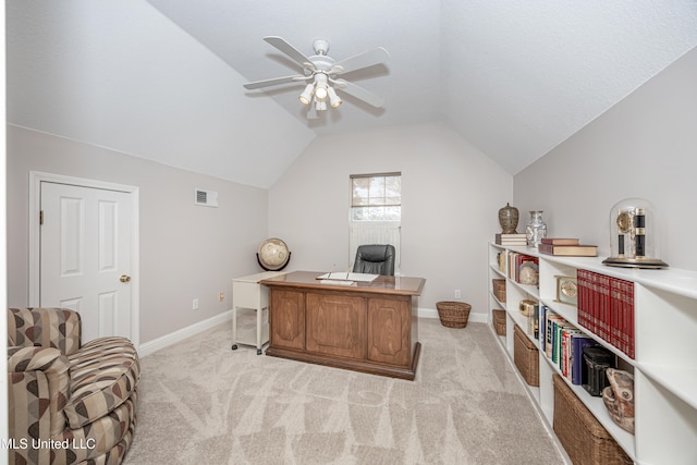 office area featuring lofted ceiling, light colored carpet, and ceiling fan