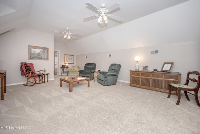 sitting room with ceiling fan, light carpet, and lofted ceiling