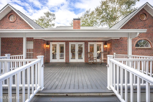 wooden terrace featuring french doors