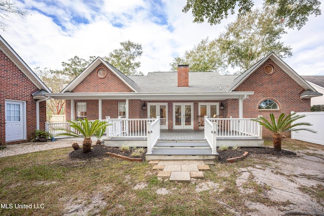 3607 Dijon Ave, Ocean Springs, MS 39564 - back of property featuring french doors, a chimney, brick siding, and a wooden deck