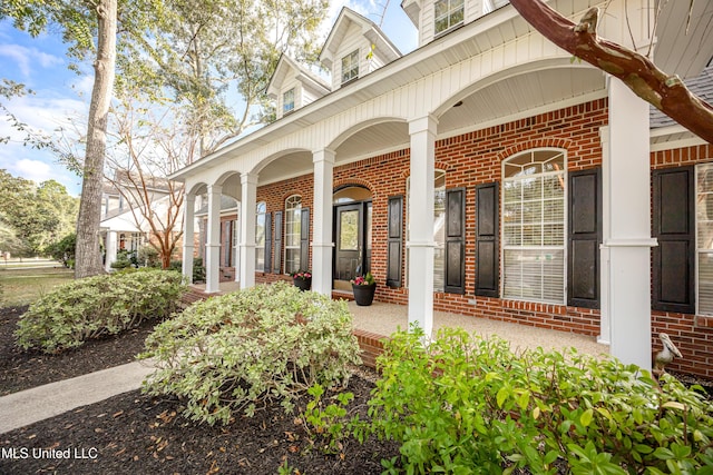 3607 Dijon Ave, Ocean Springs, MS 39564 - property entrance with brick siding and a porch
