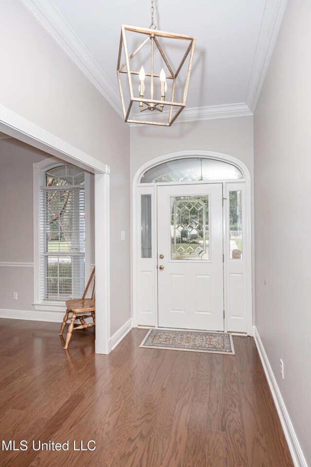 3607 Dijon Ave, Ocean Springs, MS 39564 - foyer with ornamental molding, wood finished floors, a chandelier, and baseboards