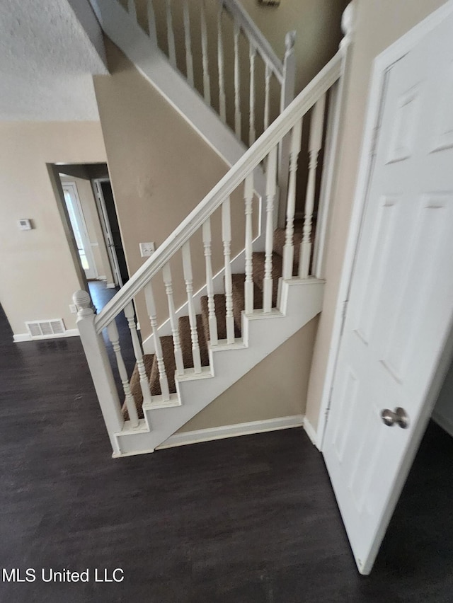 10101 Stephenson Ln, Olive Branch, MS 38654 - stairway with wood finished floors