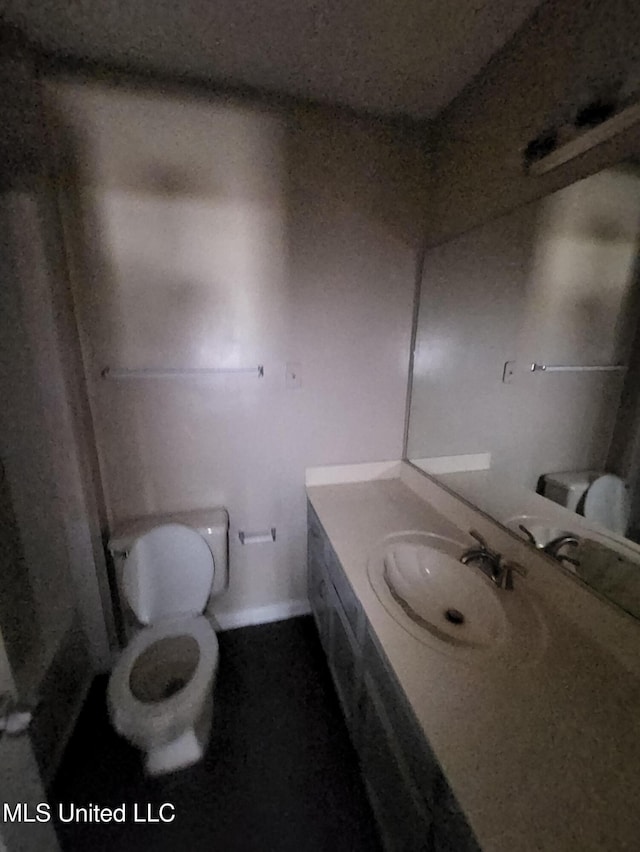 10101 Stephenson Ln, Olive Branch, MS 38654 - bathroom featuring toilet and vanity
