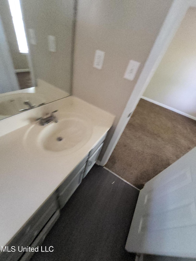 10101 Stephenson Ln, Olive Branch, MS 38654 - bathroom featuring vanity and baseboards