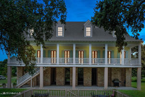 back of property featuring a patio