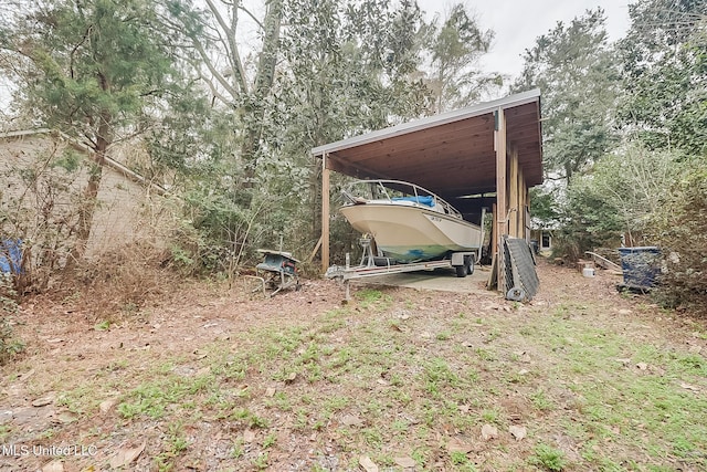 view of yard with a carport