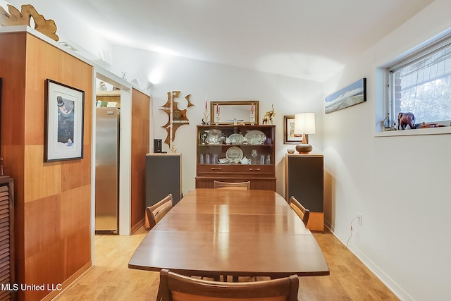 dining area featuring light wood-type flooring