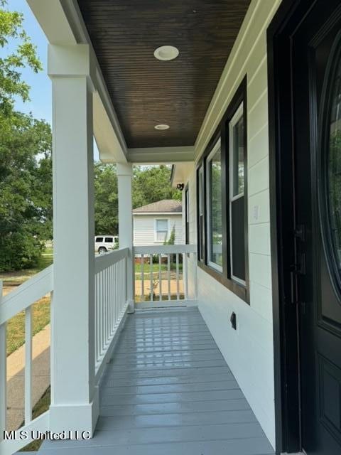 balcony featuring a porch