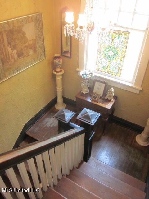 400 Crockett Ave, Greenwood, MS 38930 - staircase featuring hardwood / wood-style flooring