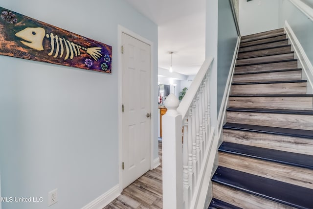 1664 Beach Blvd Unit 172, Biloxi, MS 39531 - staircase with wood finished floors and baseboards