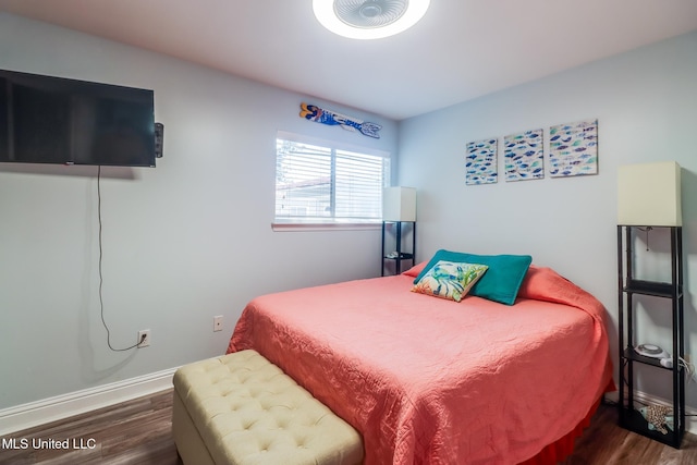 1664 Beach Blvd Unit 172, Biloxi, MS 39531 - bedroom with dark wood-type flooring and baseboards