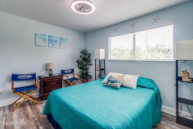 1664 Beach Blvd Unit 172, Biloxi, MS 39531 - bedroom with wood finished floors and baseboards