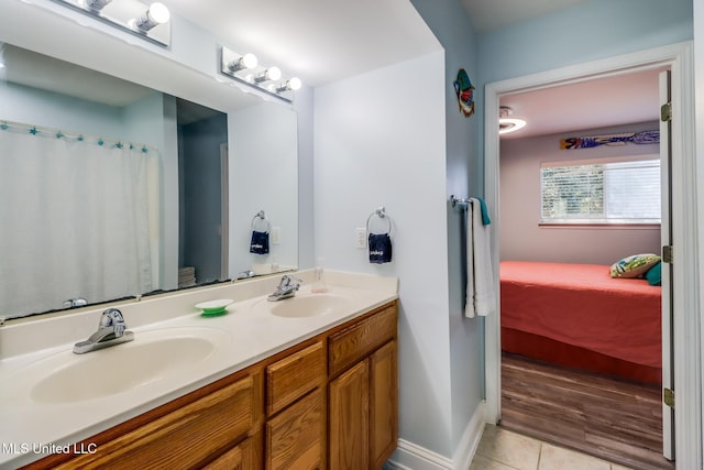 1664 Beach Blvd Unit 172, Biloxi, MS 39531 - ensuite bathroom featuring double vanity and tile patterned floors