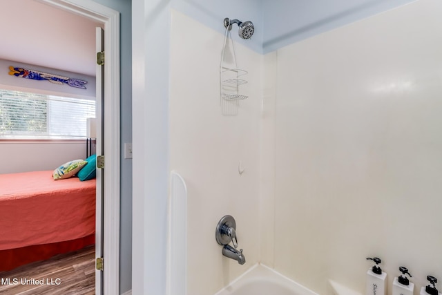 1664 Beach Blvd Unit 172, Biloxi, MS 39531 - bathroom view of ensuite bathroom, bathing tub / shower combination, and wood finished floors