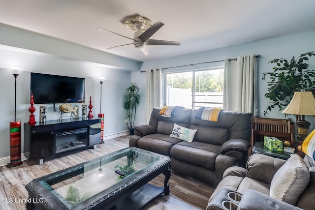 1664 Beach Blvd Unit 172, Biloxi, MS 39531 - living area with a ceiling fan and wood finished floors