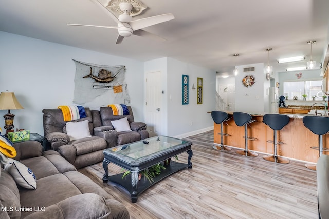1664 Beach Blvd Unit 172, Biloxi, MS 39531 - living room featuring wood finished floors and a ceiling fan